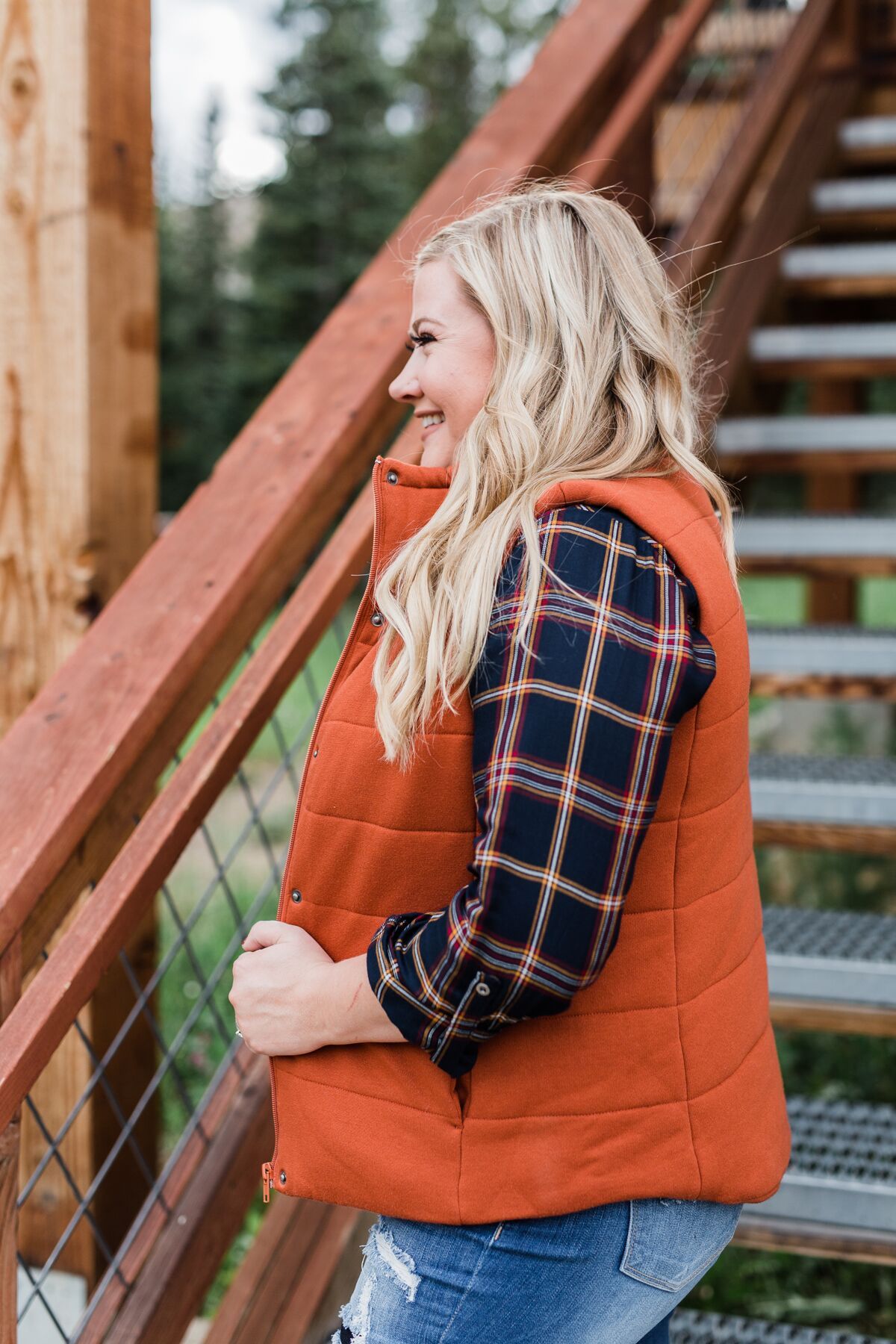 Orange puffer vest womens sales