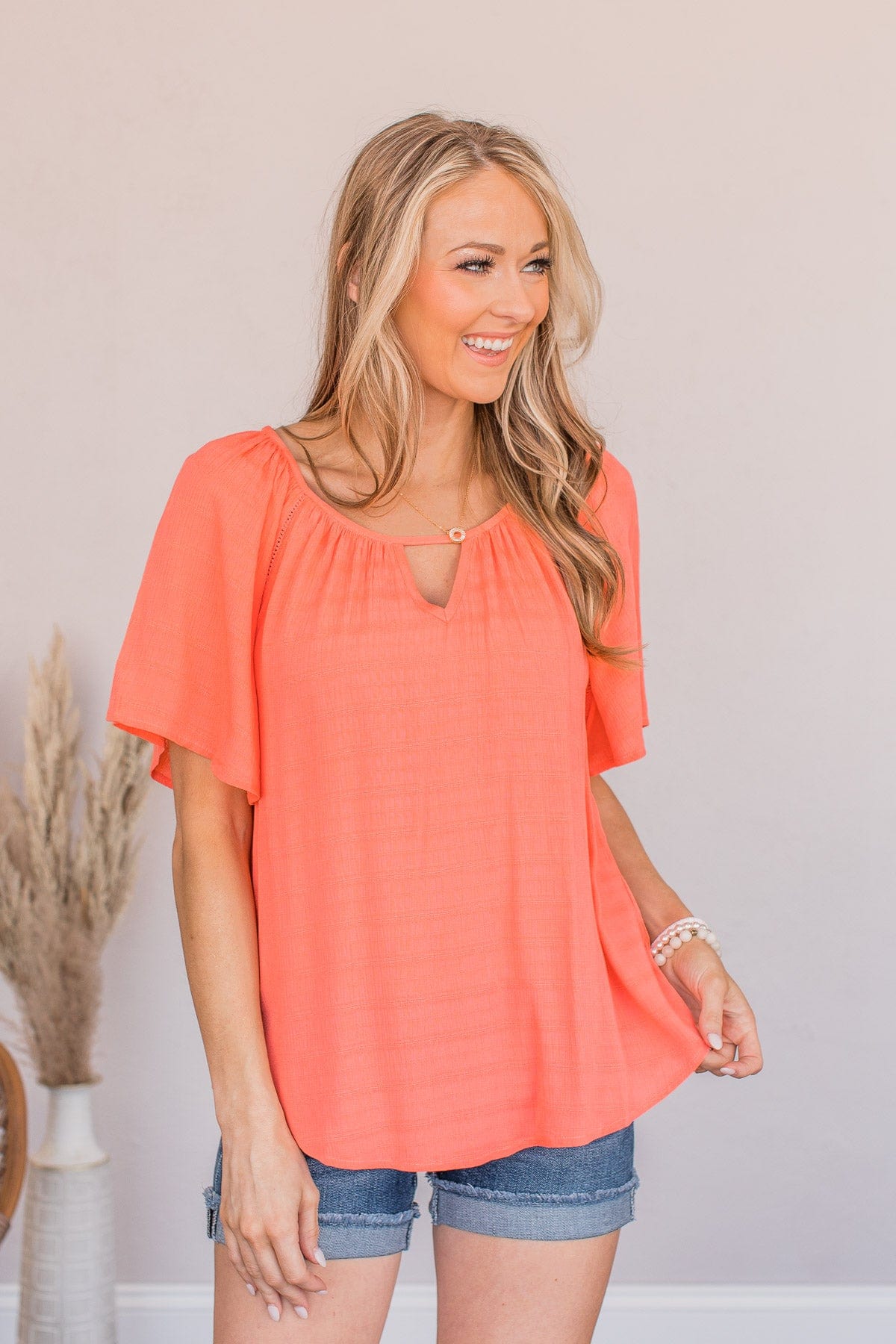 Energy Abounds Flutter Sleeve Top- Coral