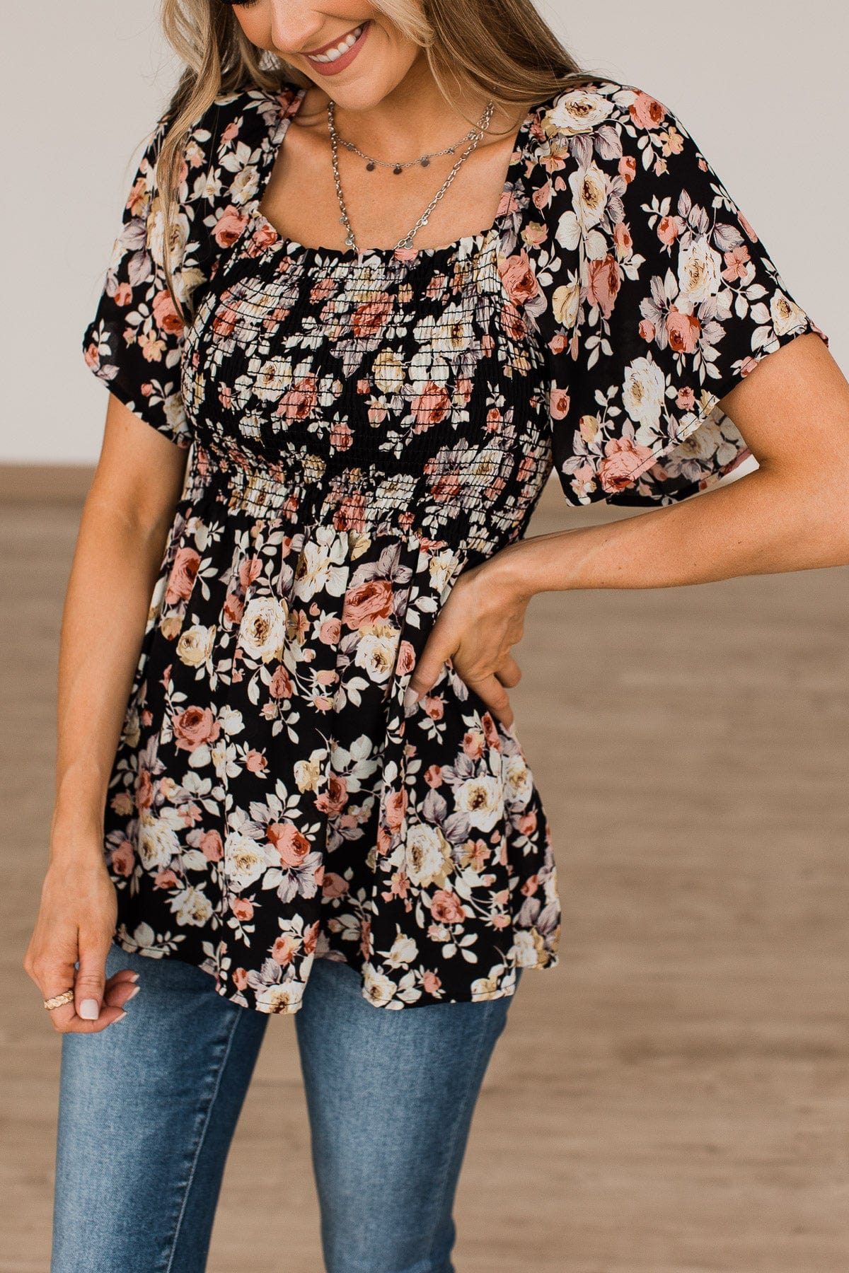 Catch A Glimpse Floral Smocked Blouse- Black