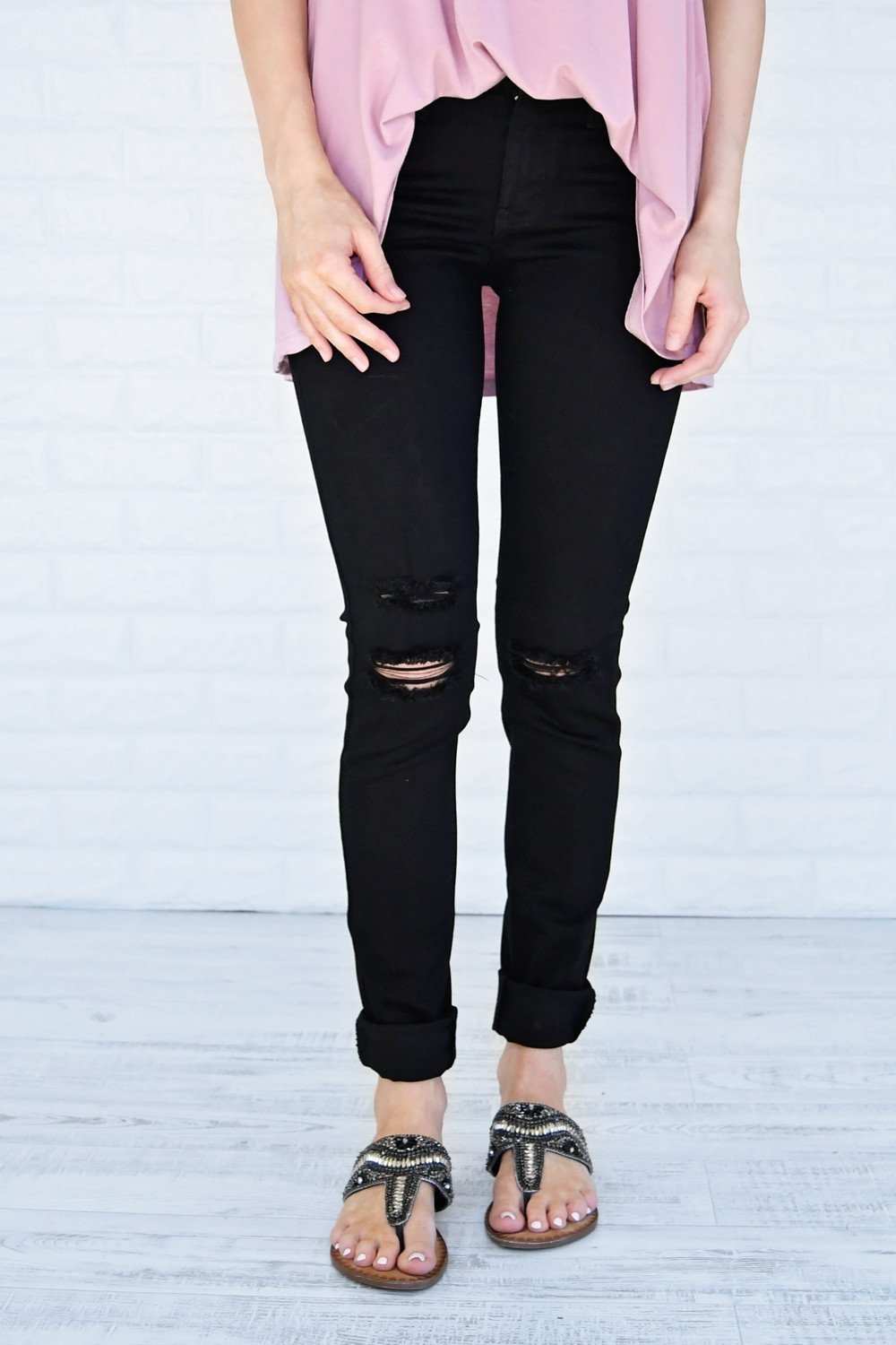 The Ultimate Black Distressed Skinnies