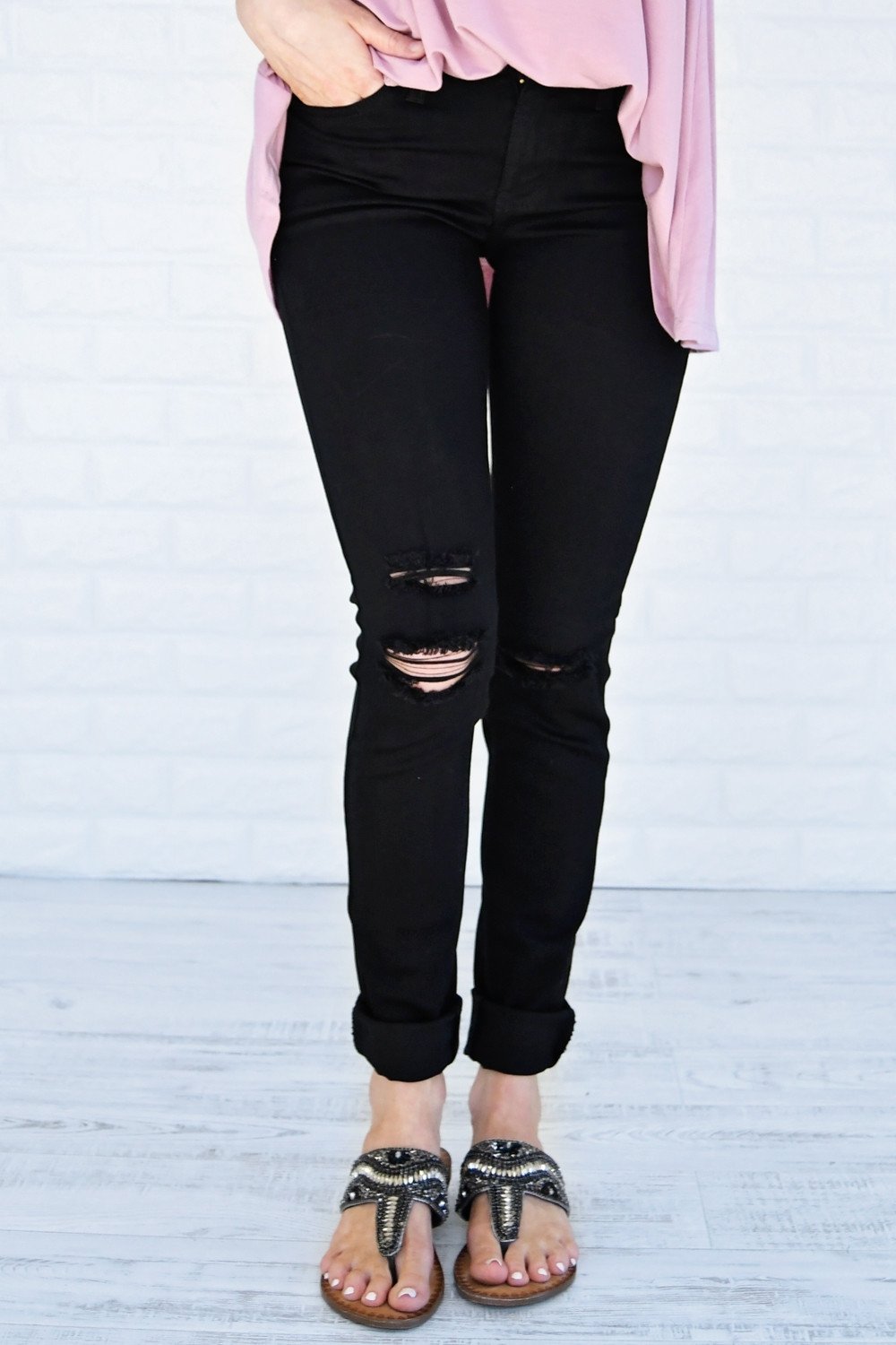The Ultimate Black Distressed Skinnies