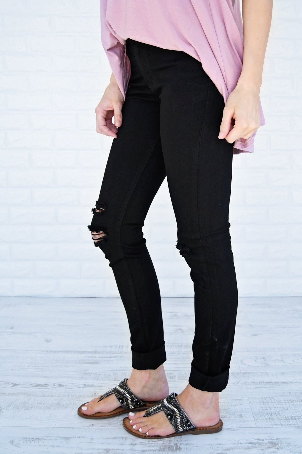 The Ultimate Black Distressed Skinnies