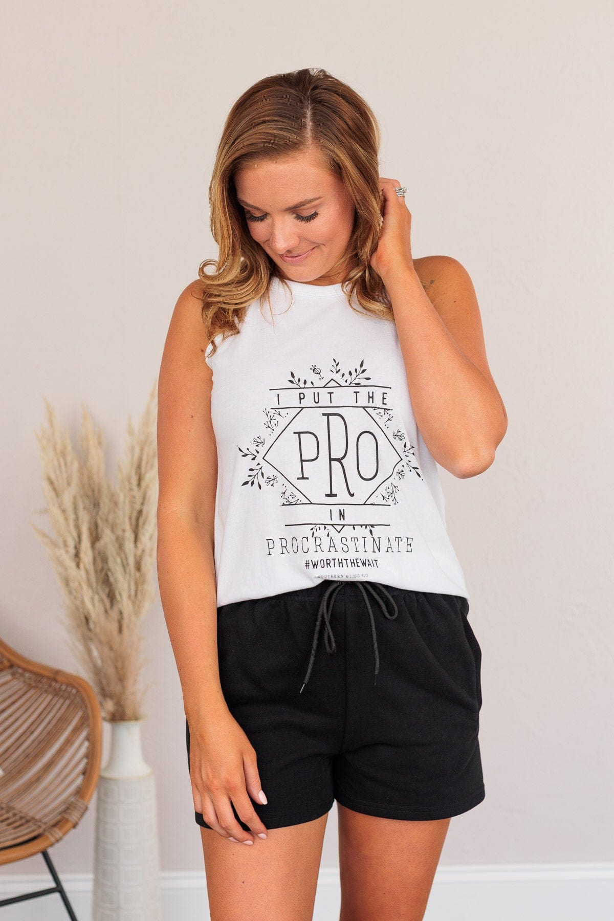 "I Put The Pro In Procrastinate" Graphic Tank Top- White