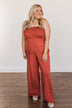 Adventure Of A Lifetime Smocked Jumpsuit- Brick