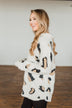 Wild One Animal Print Quarter Zip Pullover- Ivory, Black, Taupe