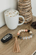 DOORBUSTER "Mama" Tassel Key Chain