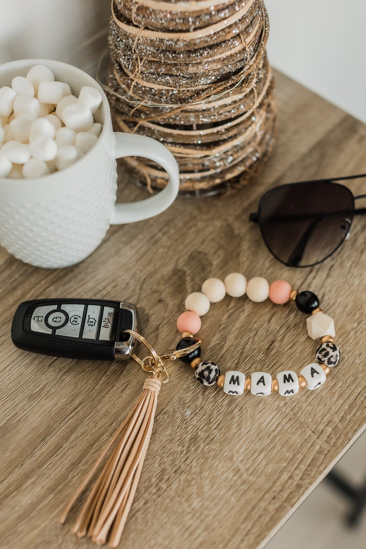 DOORBUSTER "Mama" Tassel Key Chain